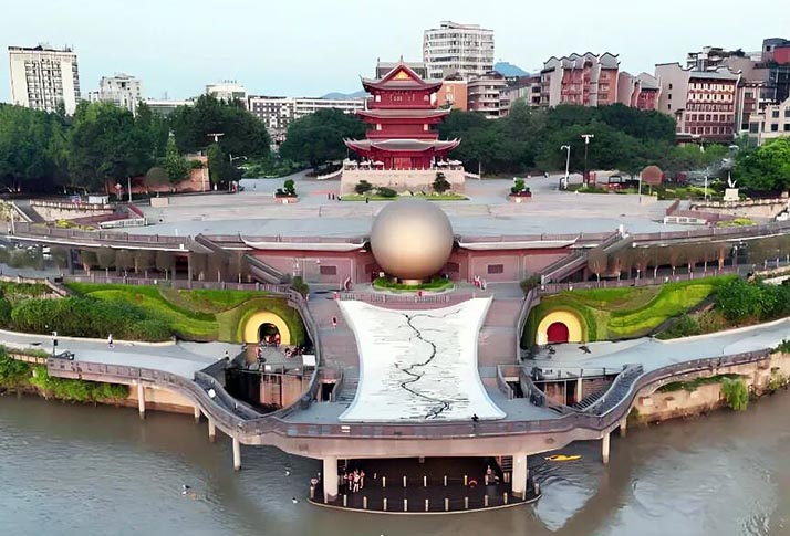 Daytime unlit view of 11m outdoor spherical LED landmark with matte‑metal outer facade