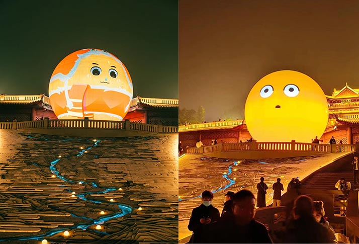 Large outdoor spherical LED landmark displaying fun emoji graphics for public‑space entertainment